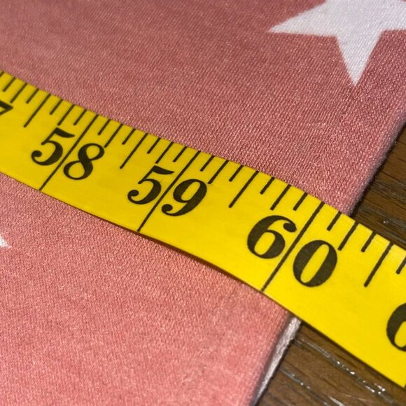 Coral Jersey Knit Fabric with a white star print 52"x60" - Picture 3 of 6